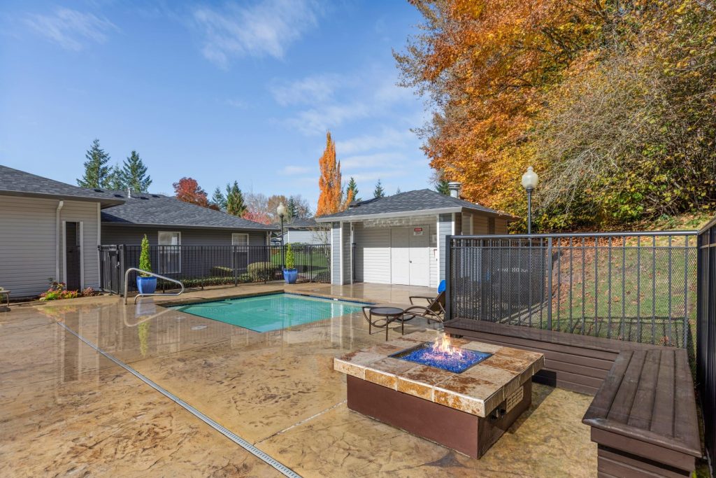 Fire pit and spa at Pebble Cove Apartments in Renton, Washington